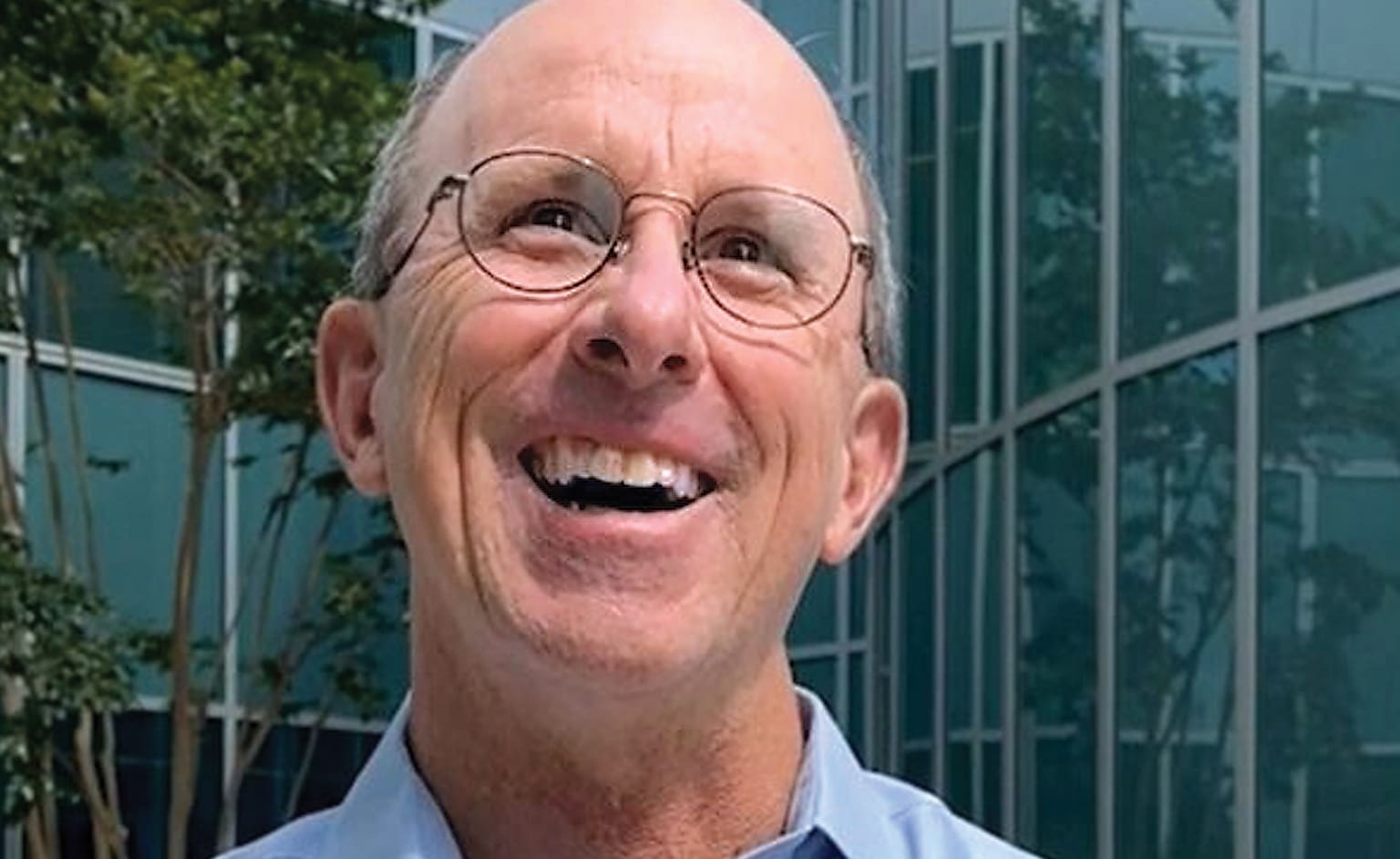 smiling older man headshot